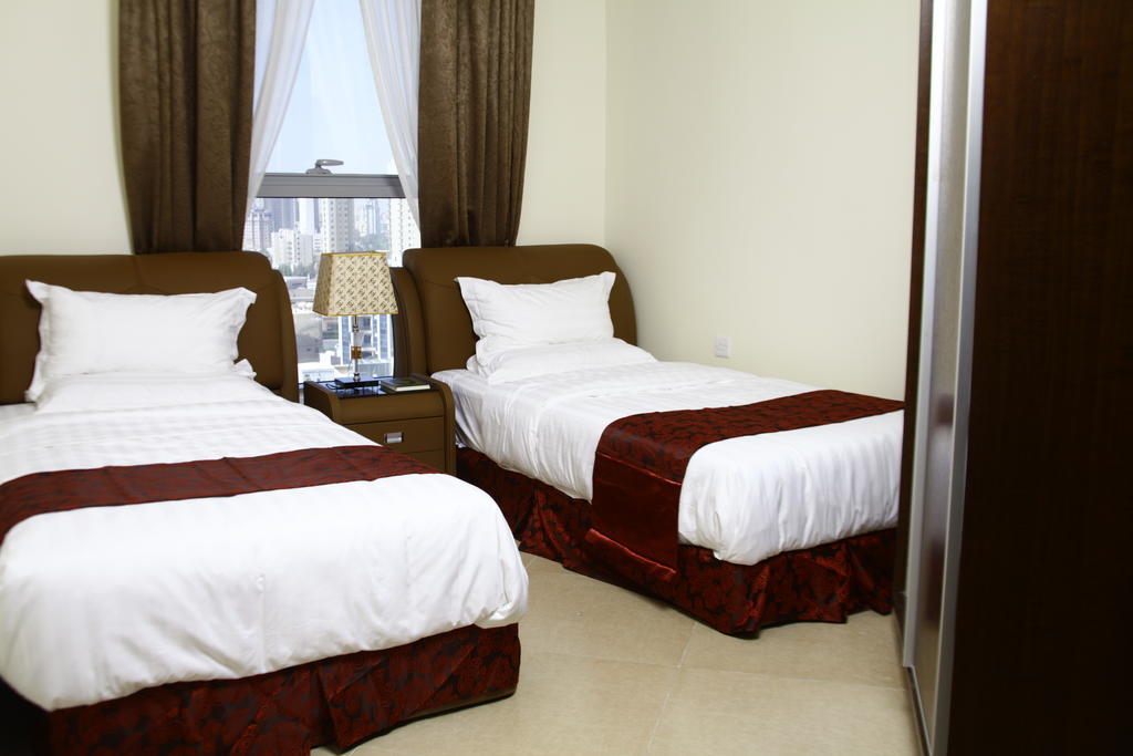 Laguna Hotel Suites Kuwait City Room photo